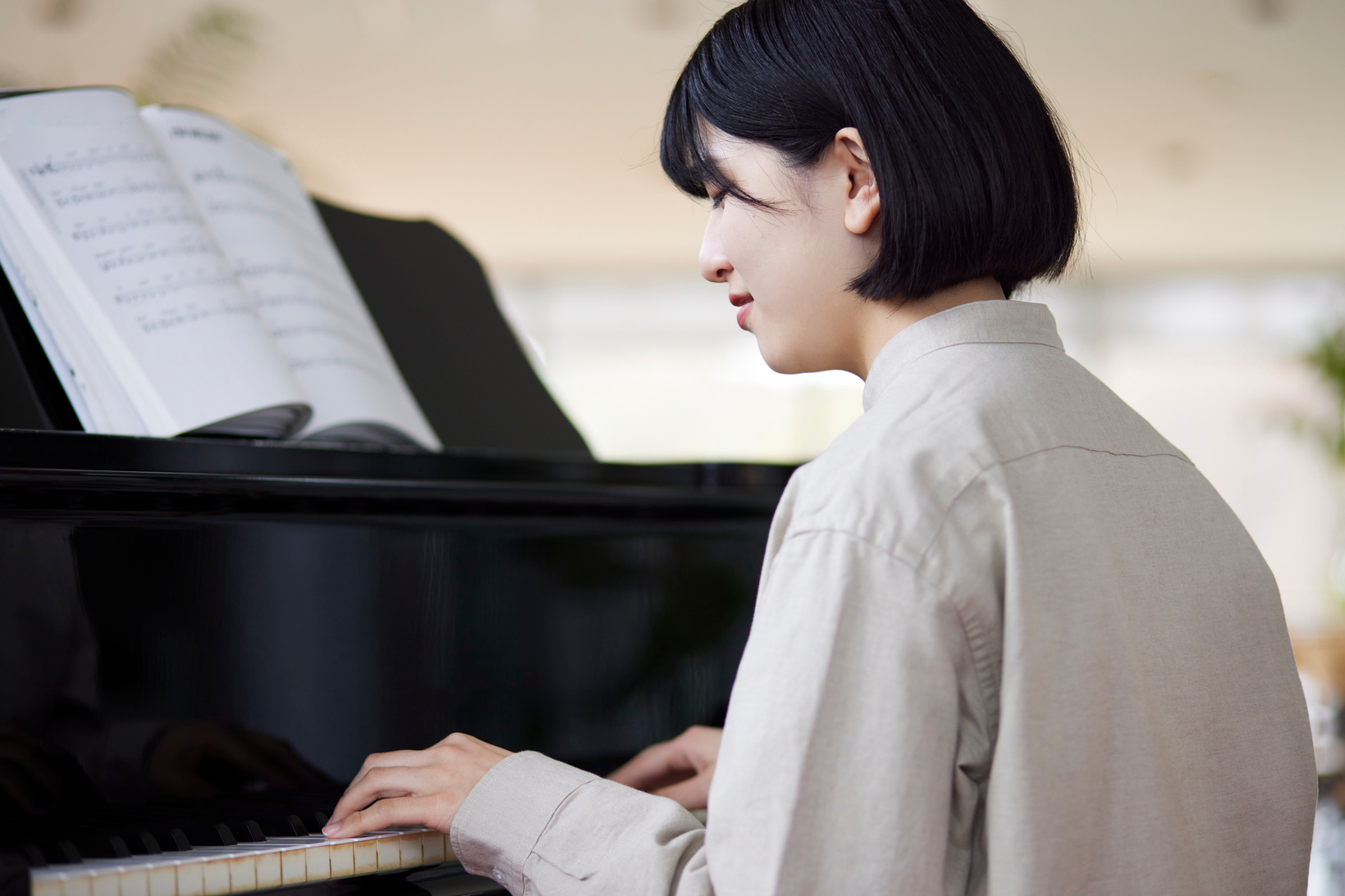 Young Japanese women playing the piano